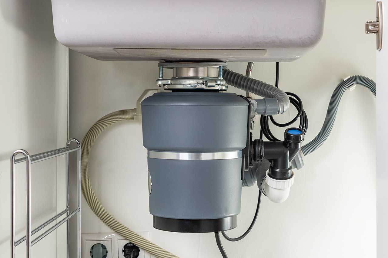 garbage disposal installed under kitchen sink