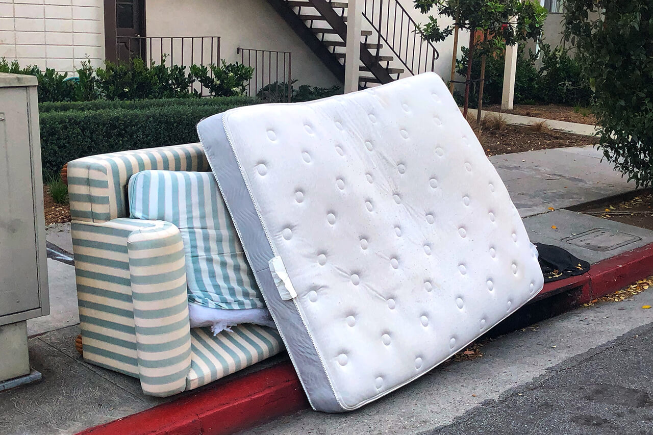 old furniture removed from home on curb for pick up
